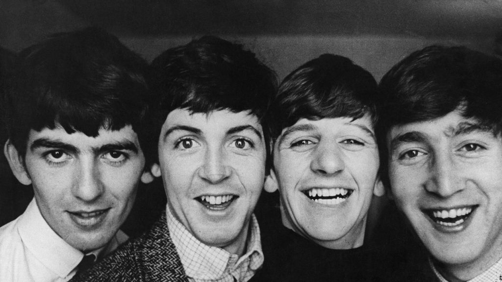 holding the beatles hair 1024x576 - You Need New Band Pics: How To Take Great Press Photos For Musicians